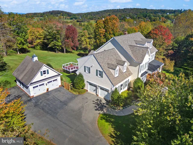an aerial view of a house with a garden