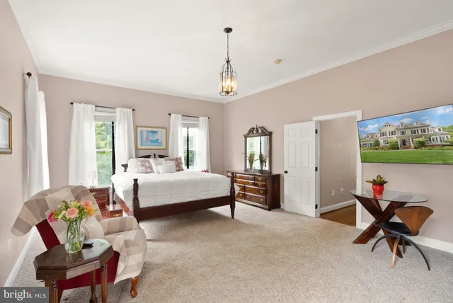 a bathroom with a sink mirror vanity and toilet