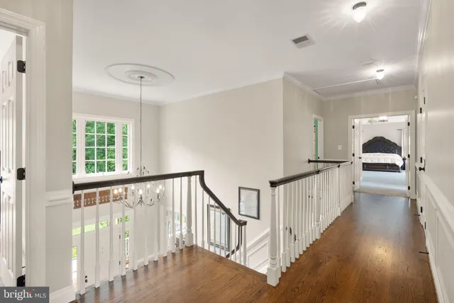 a view of a house with backyard porch and sitting area