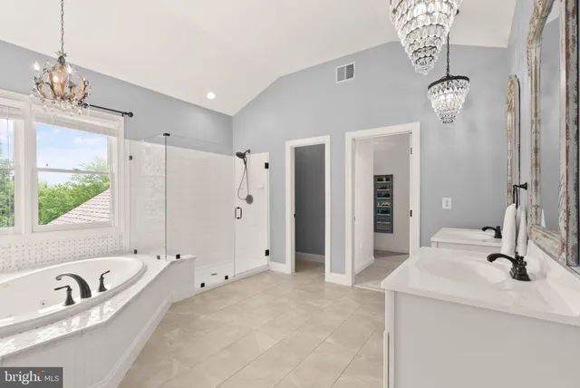 a view of a house with a backyard porch and sitting area