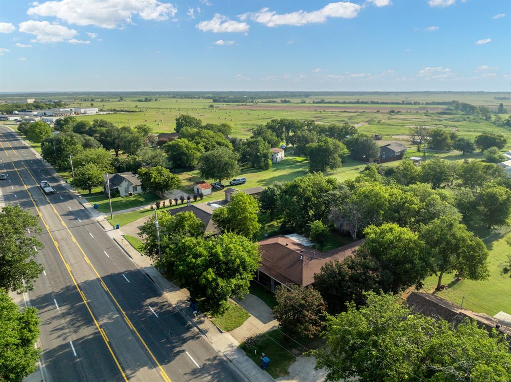 802 North Brazos Street Whitney, TX 76692 - Photo 1 of 33 an aerial view of a houses with a yard