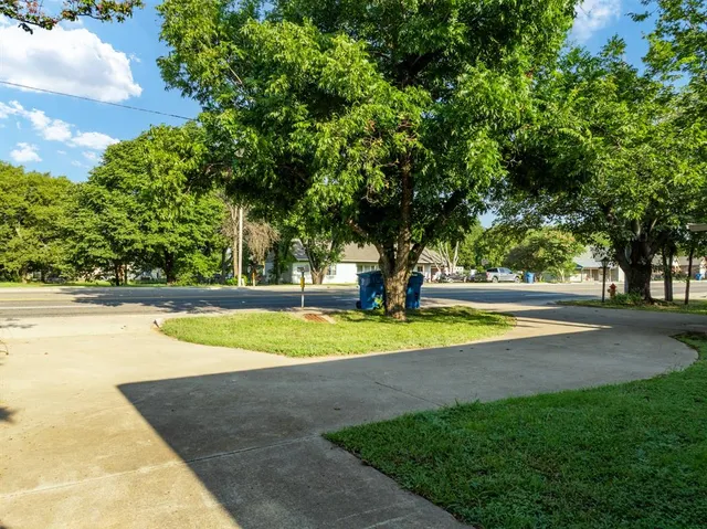 a view of swimming pool with a yard