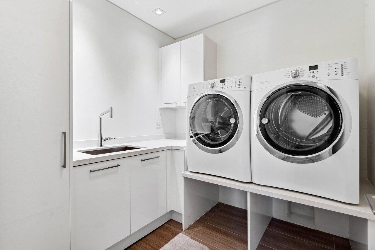 136 Mac Farlane Drive Delray Beach, FL 33483 - Photo 38 of 64 First Floor Laundry