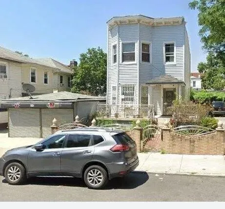 a front view of a house with swimming pool