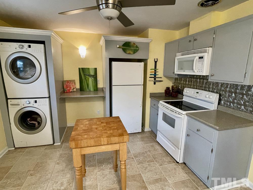 3625 Cranston Road Garner, NC 27529 - Photo 8 of 17 a utility room with sink dryer and washer