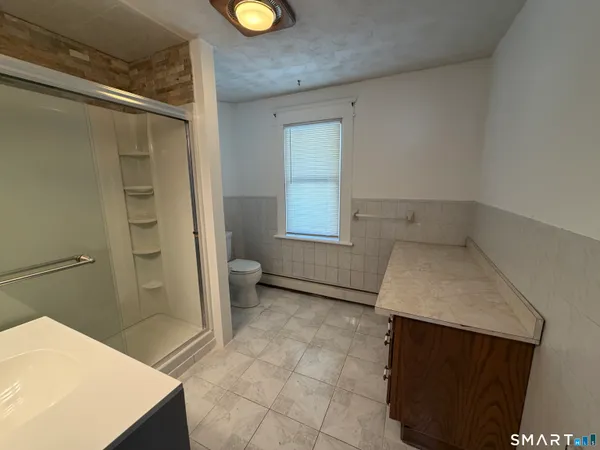 a bathroom with a sink and a vanity