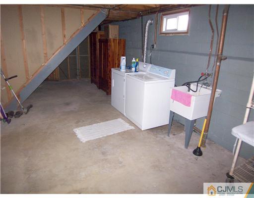 72 Middle Hill Road Colonia, NJ 07067 - Photo 16 of 17 a utility room with dryer and washer