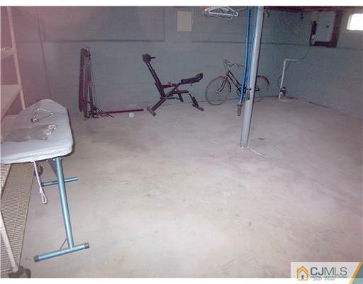 72 Middle Hill Road Colonia, NJ 07067 - Photo 17 of 17 a view of a room with gym equipment