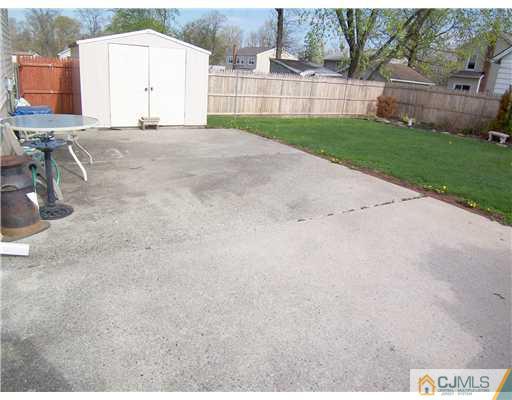 72 Middle Hill Road Colonia, NJ 07067 - Photo 10 of 17 a view of a backyard with a garden