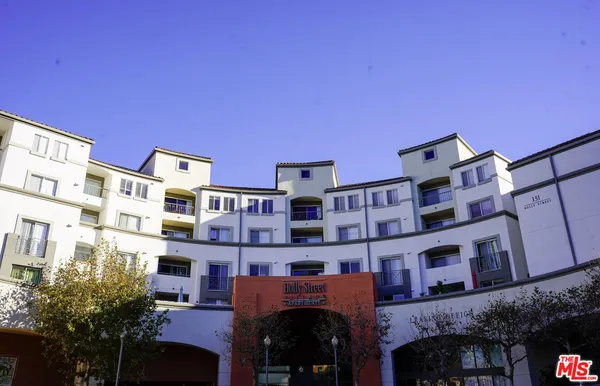 a front view of a building with balcony