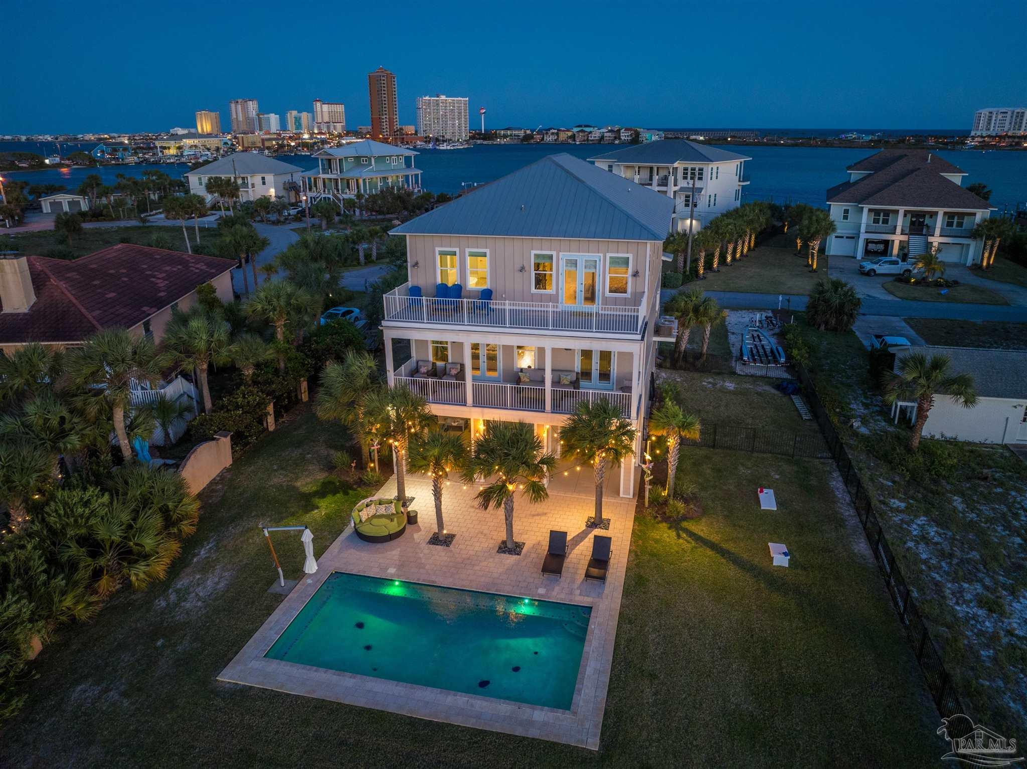 247 Sabine Drive Pensacola Beach, FL 32561 - Photo 1 of 50 an aerial view of a house