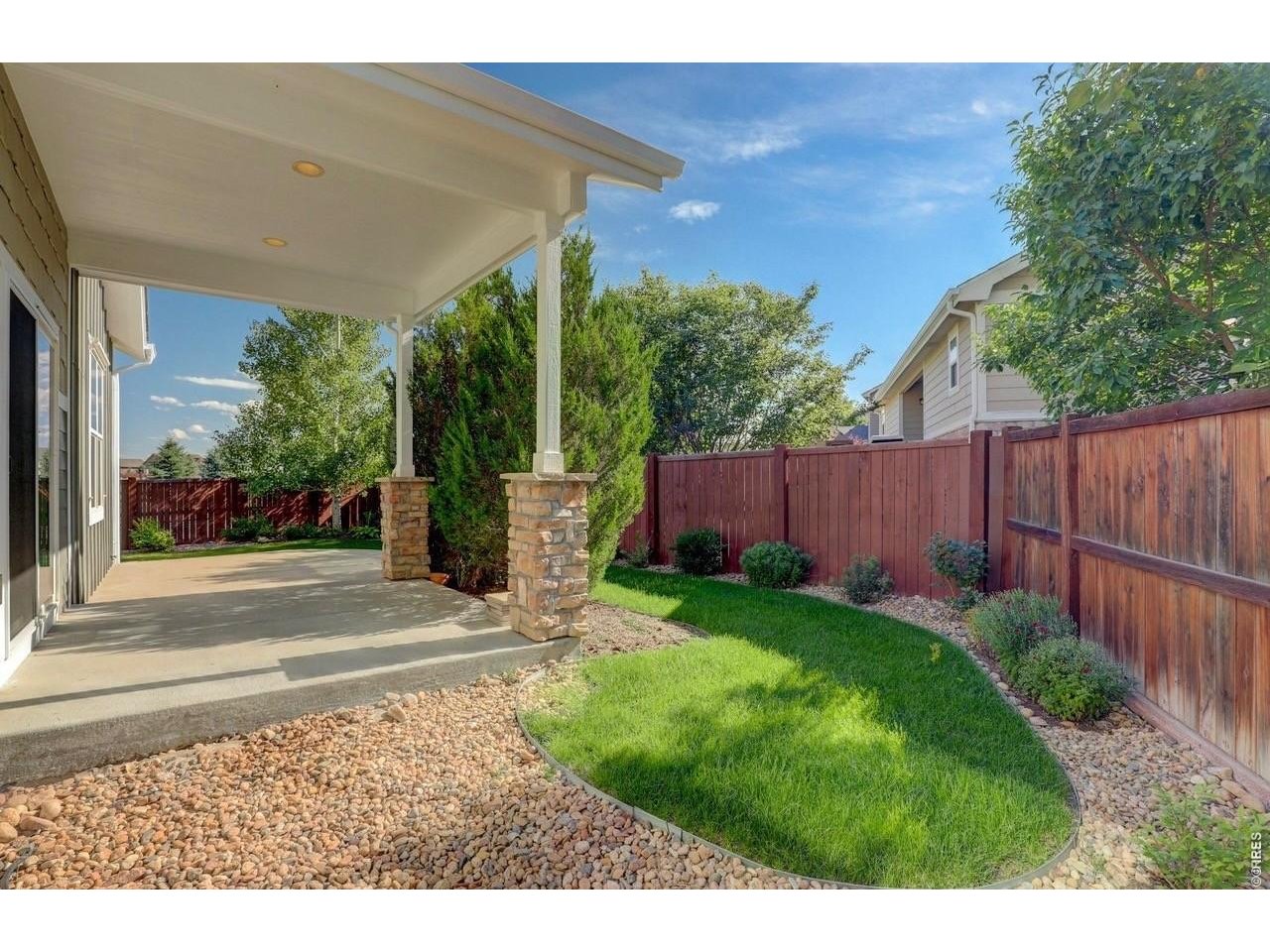 183 Kitty Hawk Court Windsor, CO 80550 - Photo 30 of 36 summertime photo