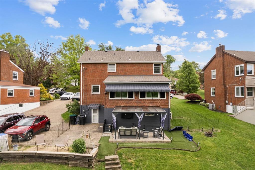 4768 Rolling Hills Road Pittsburgh, PA 15236 - Photo 2 of 46 a view of a house with a yard porch and sitting area