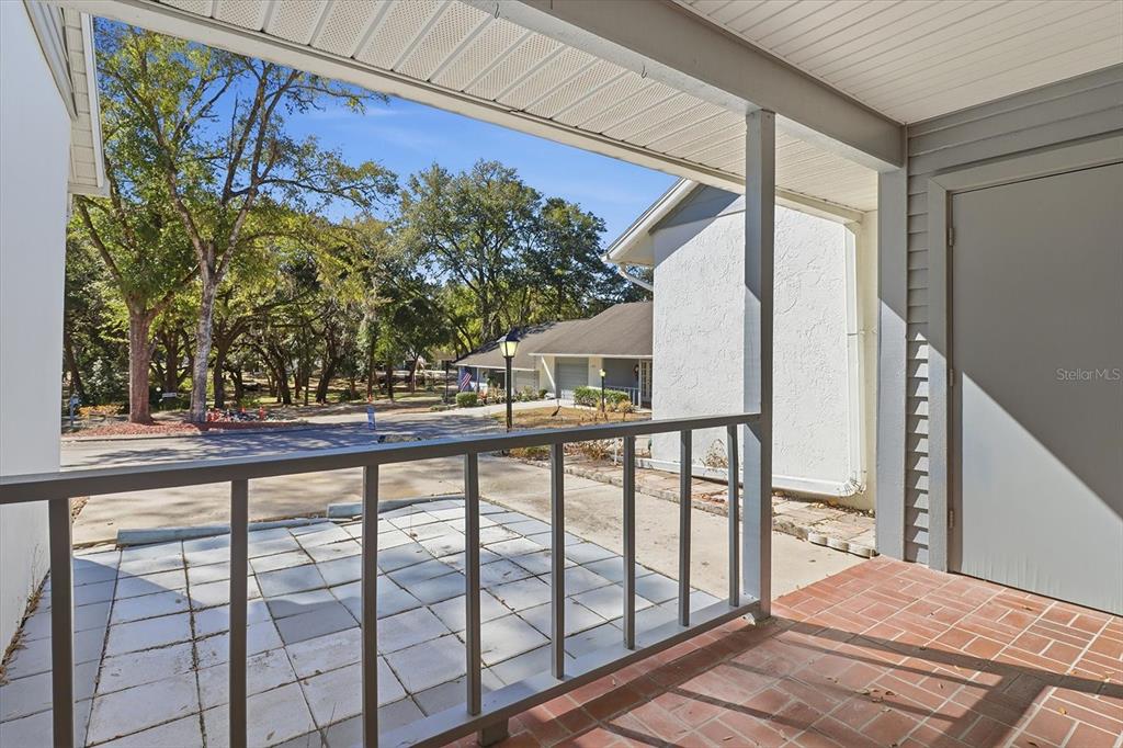 3966 North Spanish Moss Point Beverly Hills, FL 34465 - Photo 5 of 39 a view of balcony with wooden floor and fence