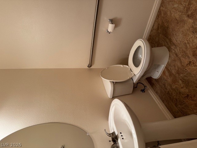 3744 River Heights Lane Logandale, NV 89021 - Photo 6 of 17 A well-appointed lavatory offers essential fixtures for convenience and comfort.