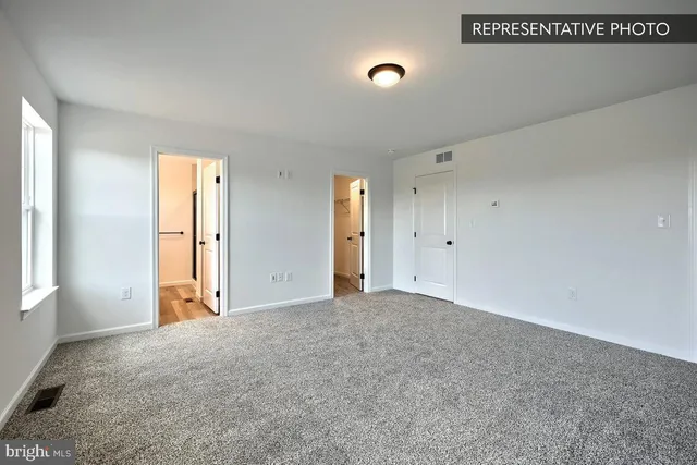 an empty room with an entryway