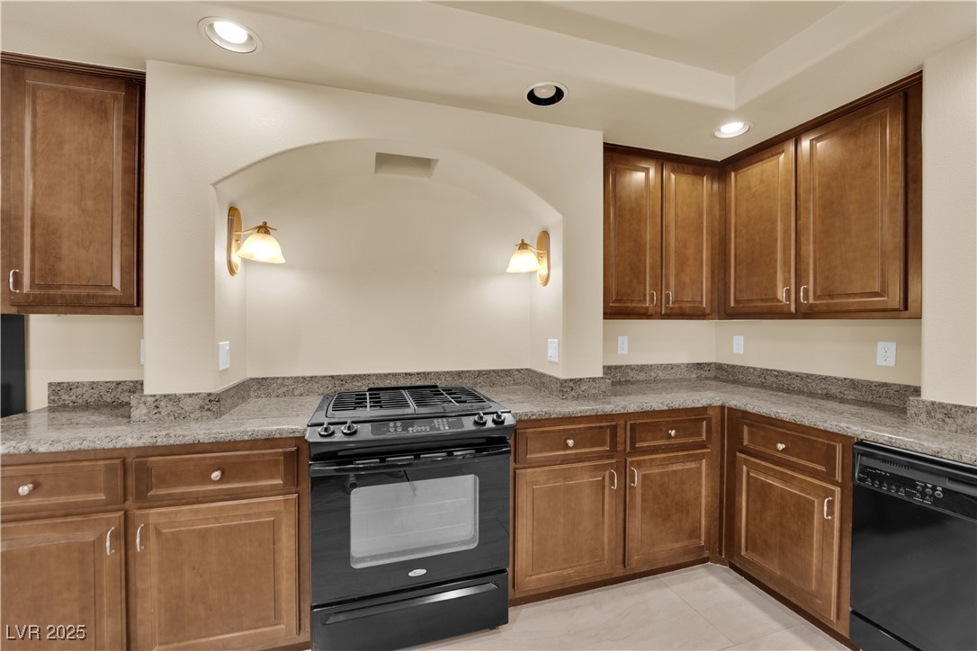 1142 Sax Fifth Avenue Henderson, NV 89052 - Photo 21 of 44 Charming arched cooking alcove with custom lighting and abundant counter space.