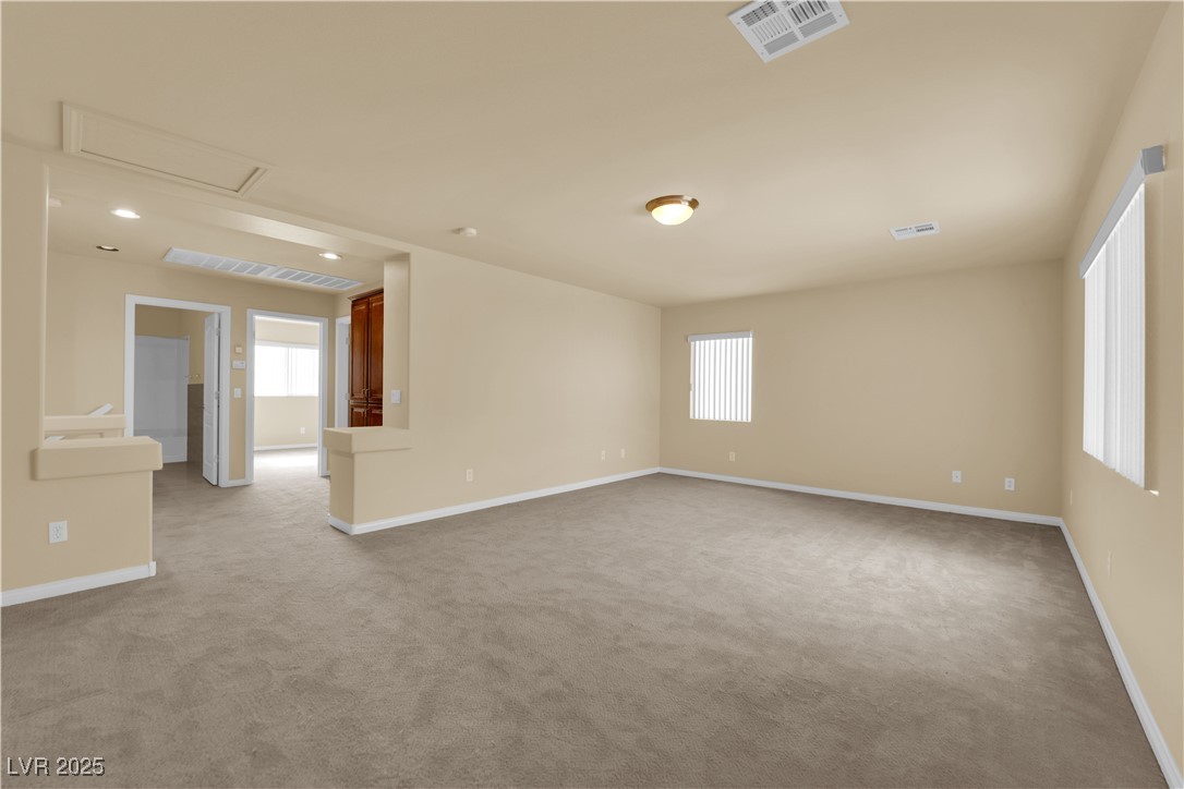 1142 Sax Fifth Avenue Henderson, NV 89052 - Photo 32 of 44 Open-concept loft offering flexible layout options and easy access to bedrooms and bath.