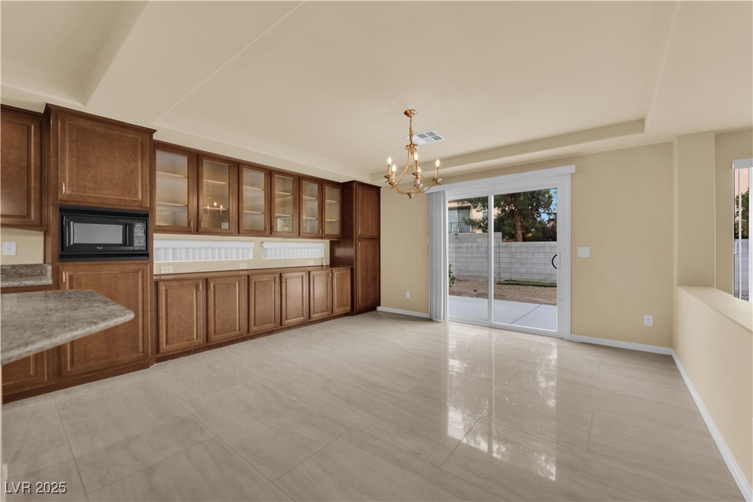 1142 Sax Fifth Avenue Henderson, NV 89052 - Photo 10 of 44 Beautiful dining room with a lot of room.