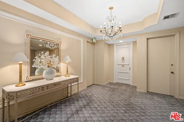 a spacious bathroom with a double vanity sink and a mirror