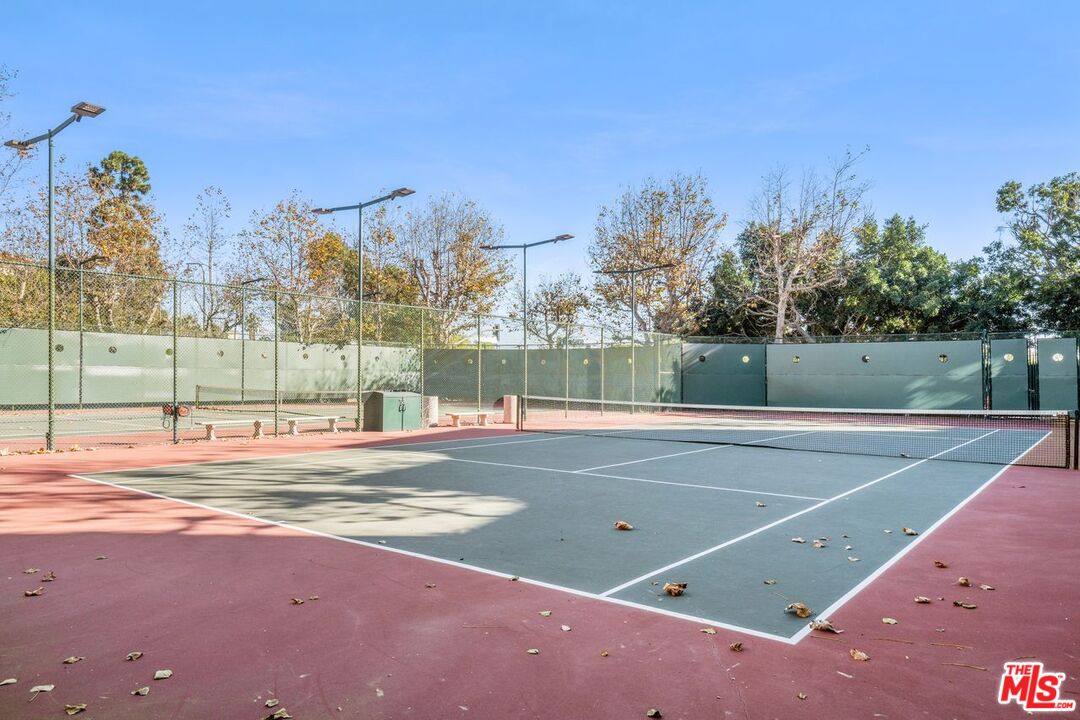 10114 Empyrean Way, Unit 302 Los Angeles, CA 90067 - Photo 33 of 37 a view of a tennis court