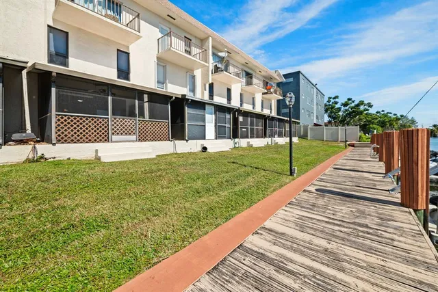 a view of a lake with sitting area