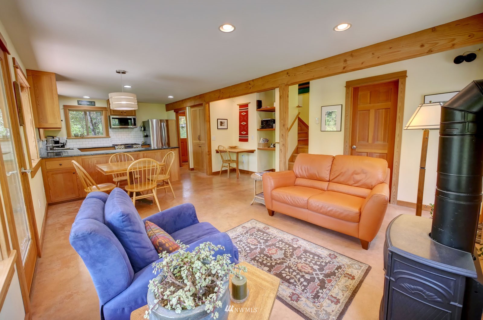 22 Trillium Road Winthrop, WA 98862 - Photo 18 of 40 a living room with furniture fireplace and flat screen tv