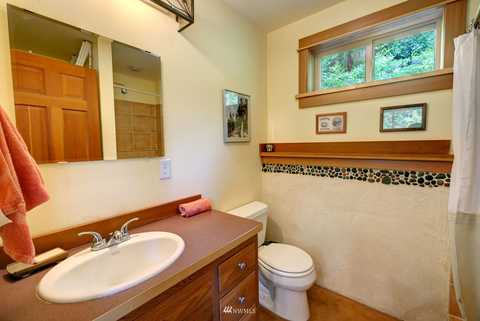 22 Trillium Road Winthrop, WA 98862 - Photo 20 of 40 a bathroom with a sink and a mirror