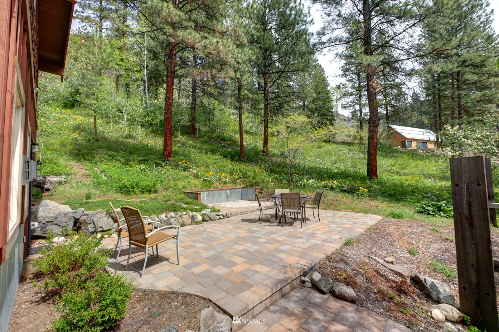 22 Trillium Road Winthrop, WA 98862 - Photo 28 of 40 a view of backyard with seating area and green space
