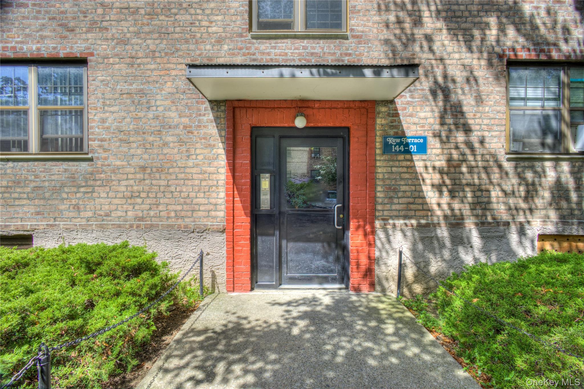 14401 78th Road, Unit 2B Queens, NY 11367 - Photo 21 of 29 View of exterior entry featuring brick siding