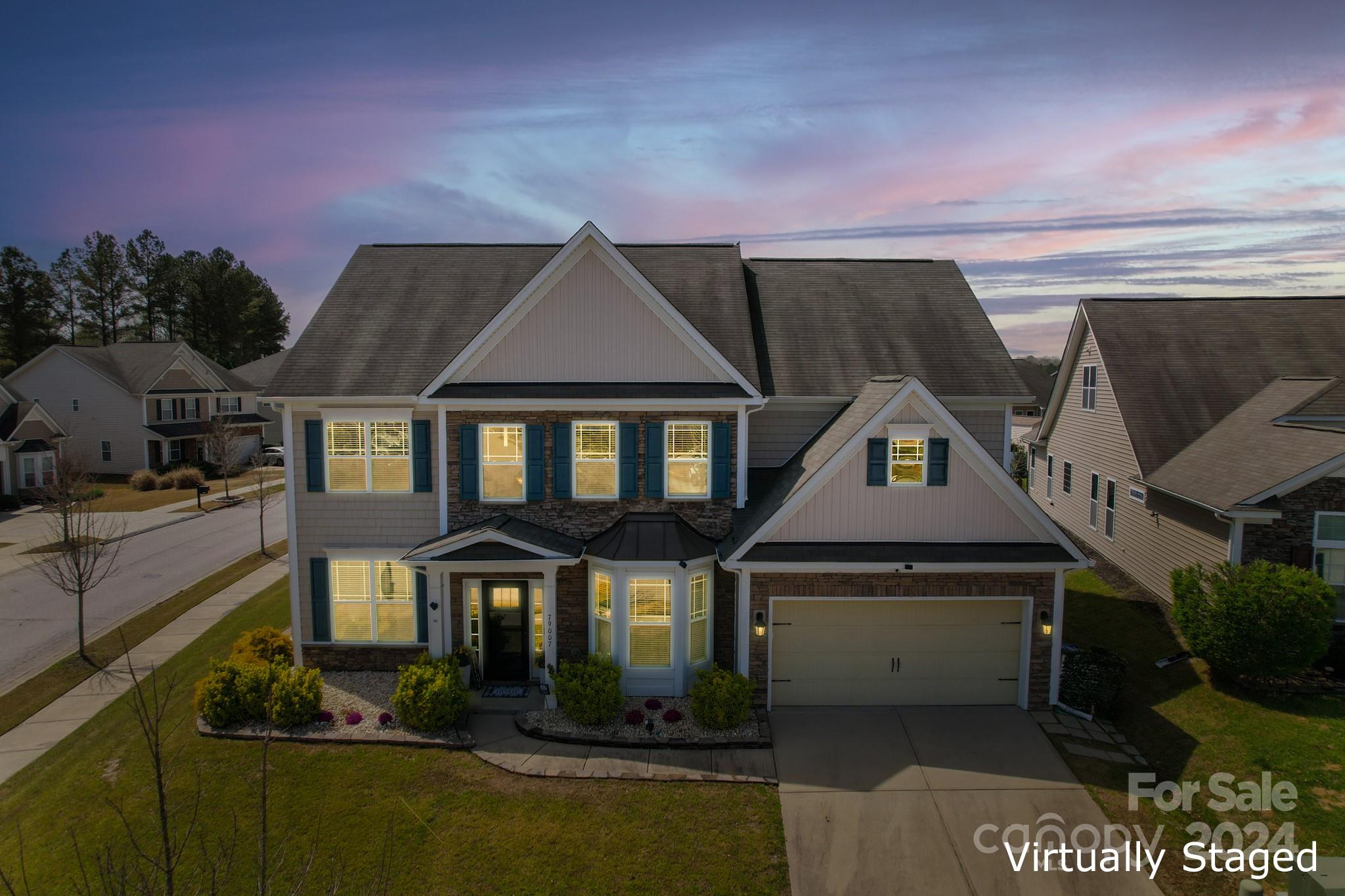 79007 Ridgehaven Road Lancaster, SC 29720 - Photo 1 of 48 a front view of a house with garden
