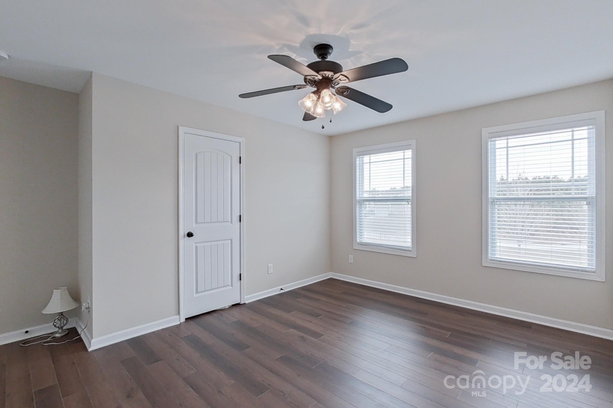79007 Ridgehaven Road Lancaster, SC 29720 - Photo 36 of 48 a view of an empty room with wooden floor and a window