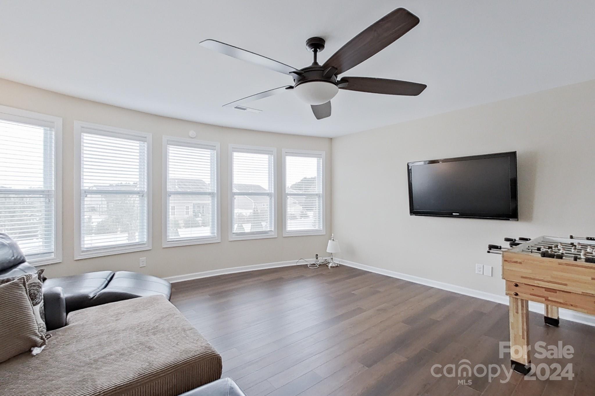 79007 Ridgehaven Road Lancaster, SC 29720 - Photo 38 of 48 a living room with furniture and a flat screen tv