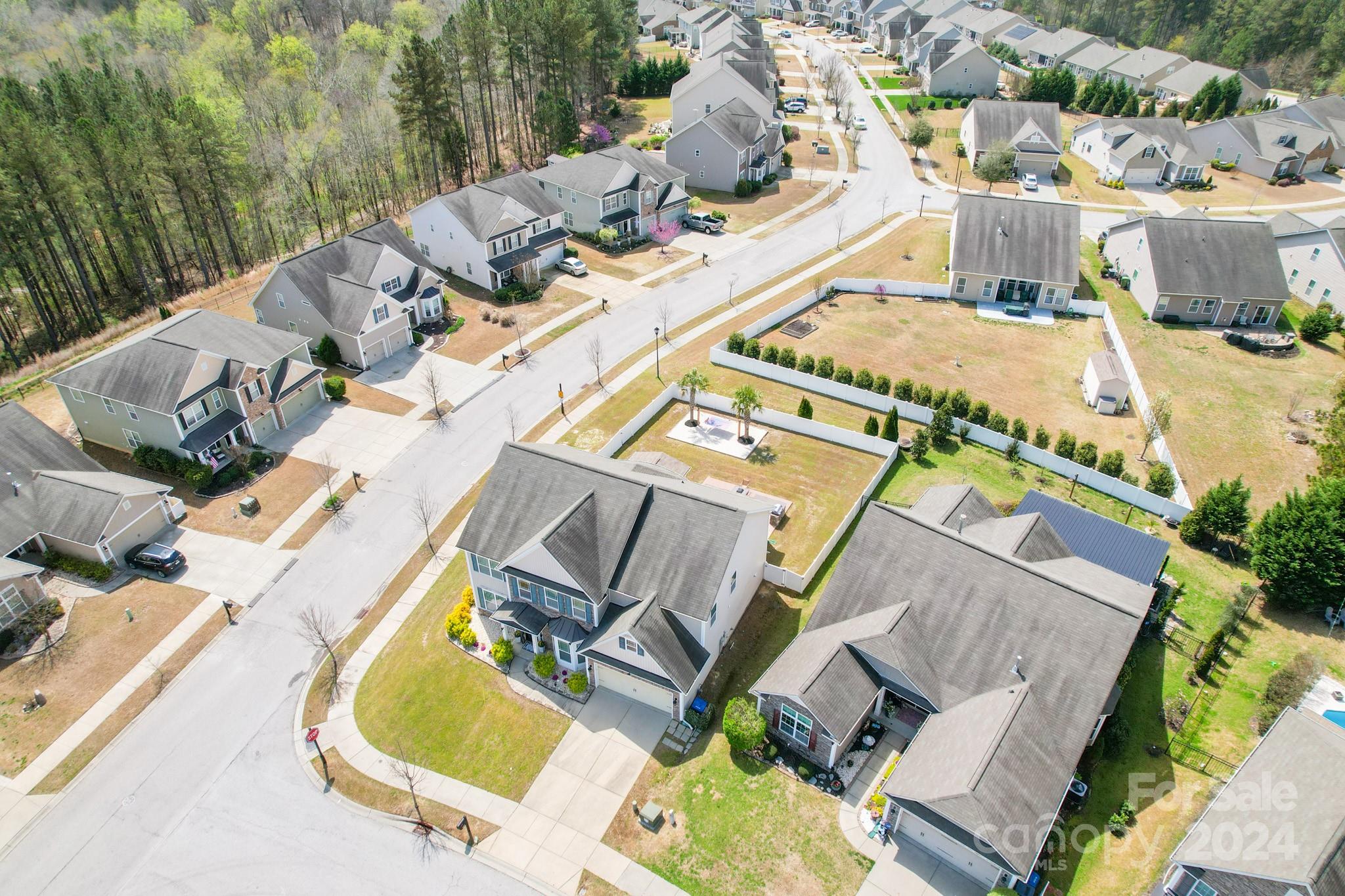 79007 Ridgehaven Road Lancaster, SC 29720 - Photo 4 of 48 an aerial view of a swimming pool with outdoor seating