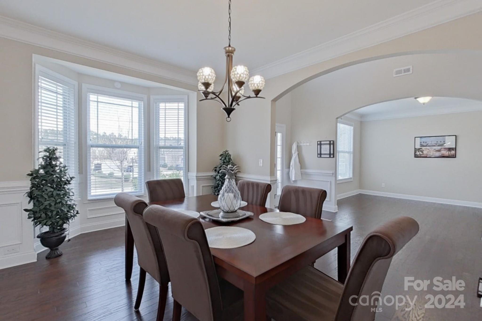 79007 Ridgehaven Road Lancaster, SC 29720 - Photo 8 of 48 a view of a dining room with furniture window and wooden floor