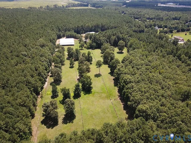 a view of a road with a yard