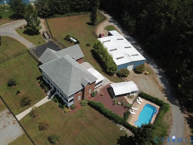 a view of a lake with a yard