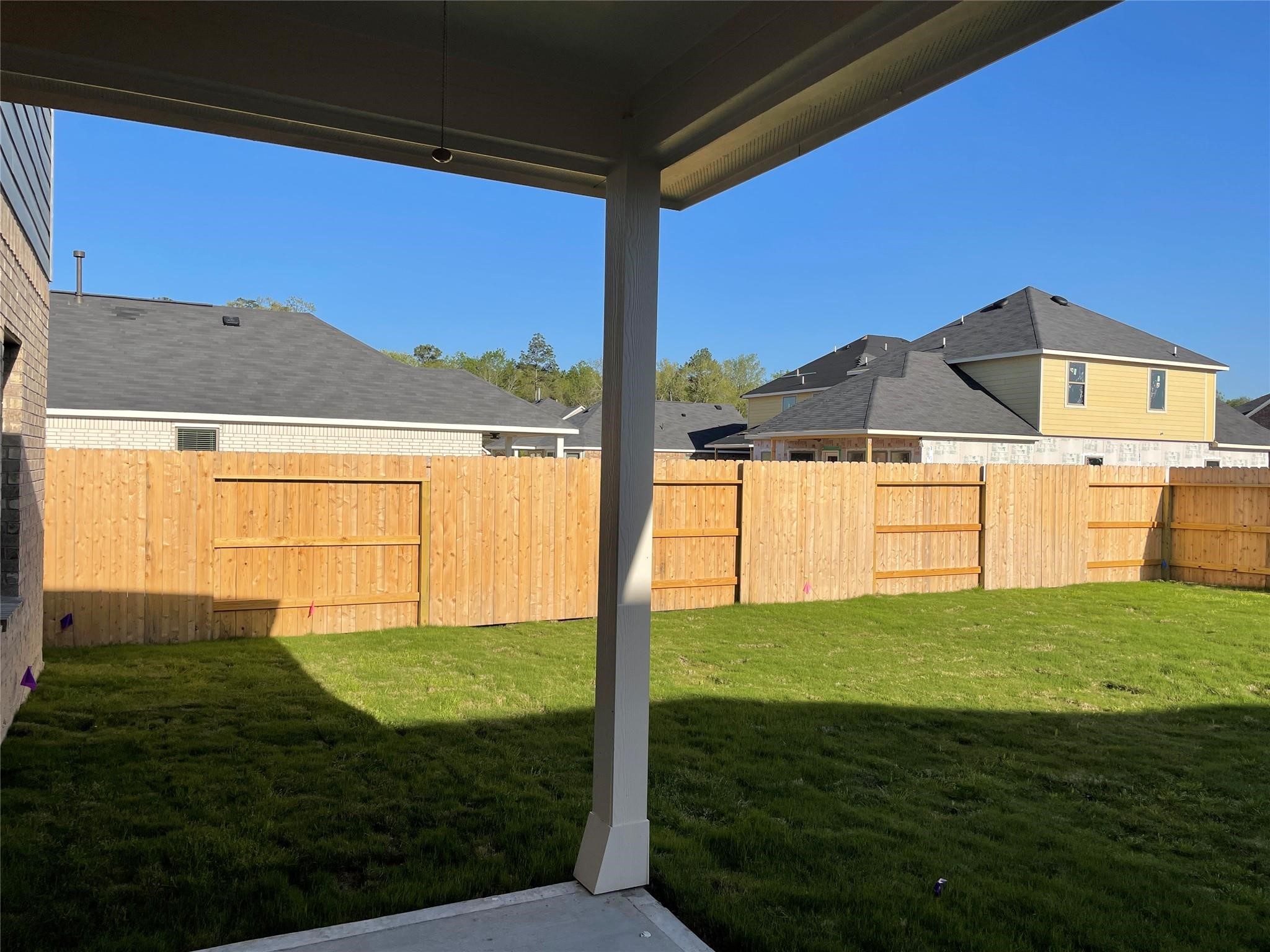 10638 Whitejacket Conroe, TX 77385 - Photo 15 of 25 a view of an outdoor space with a swimming pool