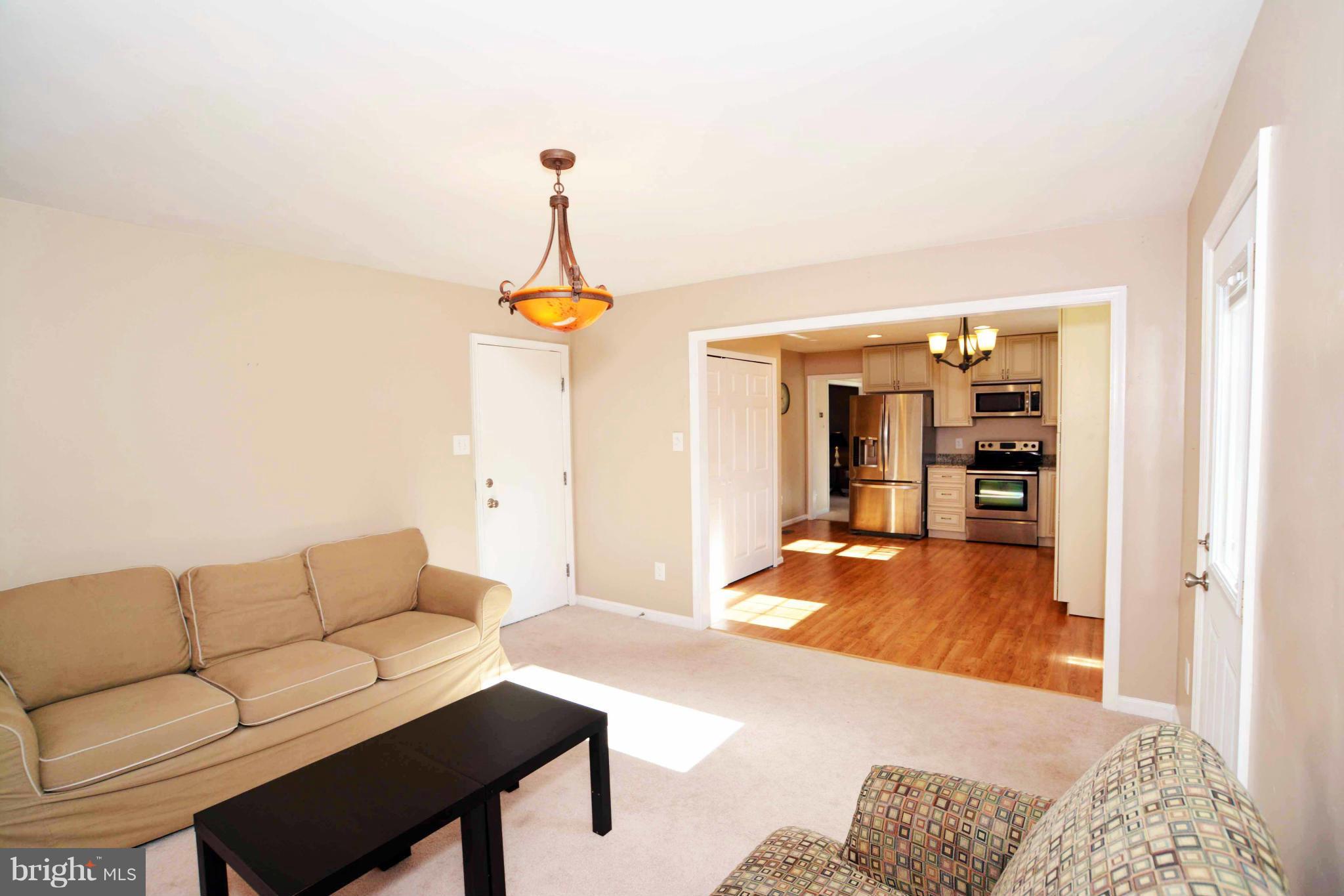 15213 Elk Run Road Chantilly, VA 20151 - Photo 17 of 26 FAMILY ROOM INTO KITCHEN