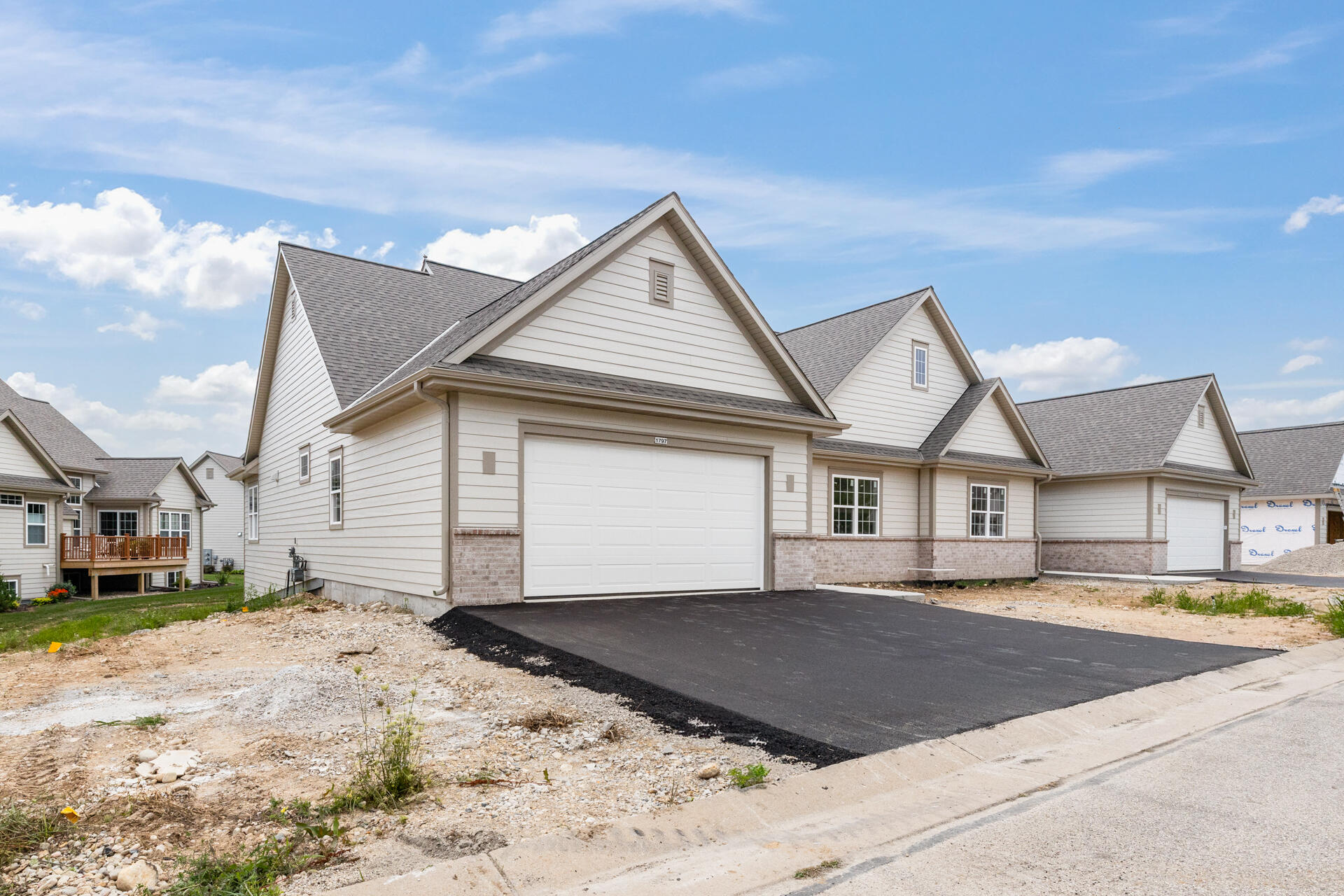 1797 Cedar Ridge Drive, Unit 2152 Slinger, WI 53086 - Photo 1 of 39 7-Exterior_1797 Cedar Ridge