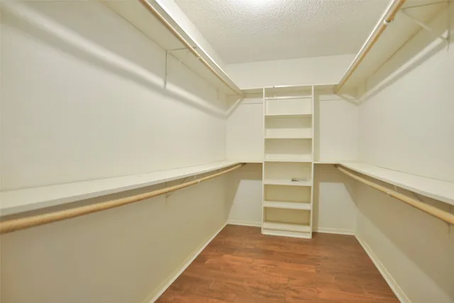 a view of an empty walk in closet