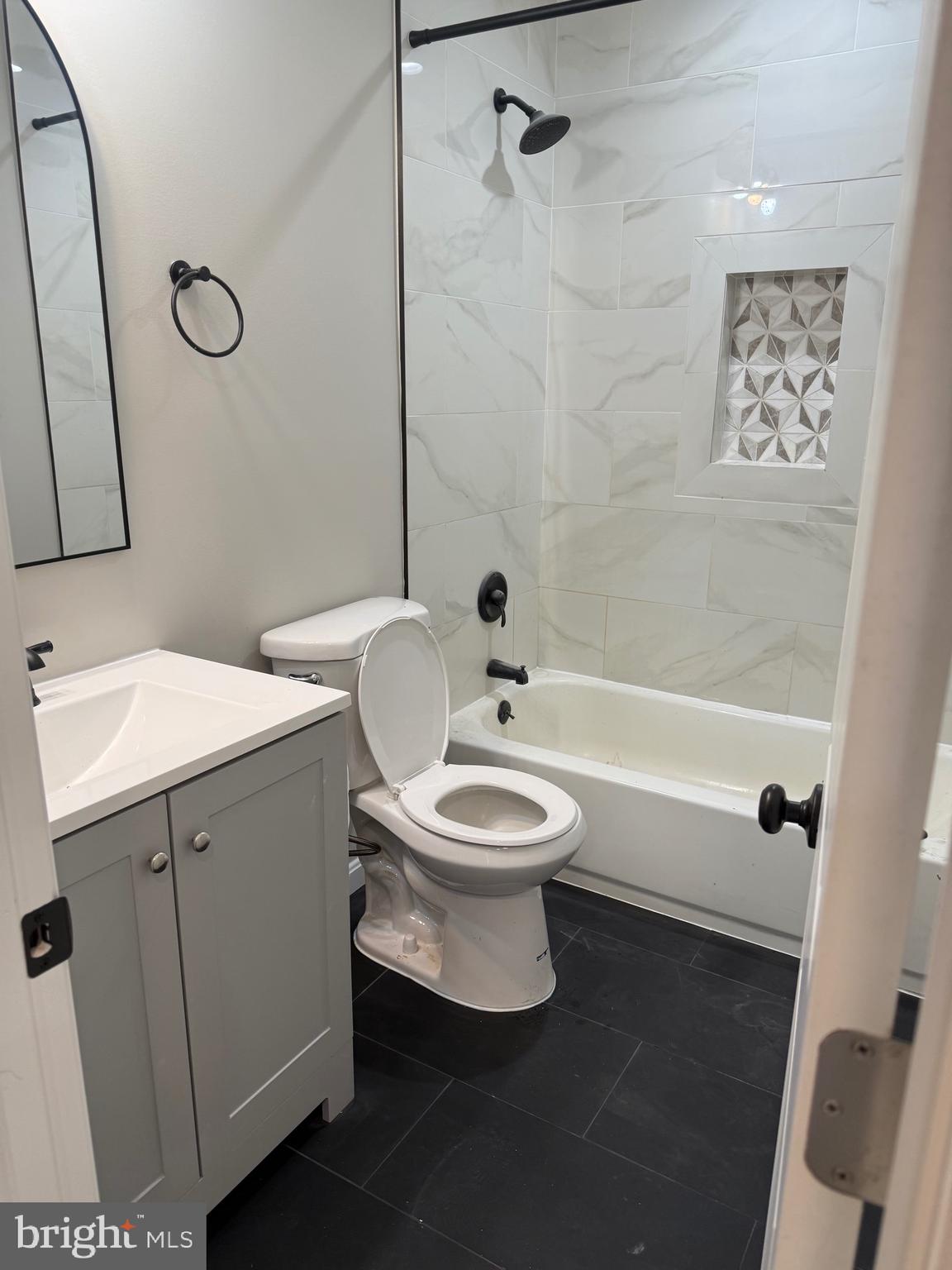 12713 Foxtrot Road Bealeton, VA 22712 - Photo 11 of 19 a bathroom with a sink a toilet and shower