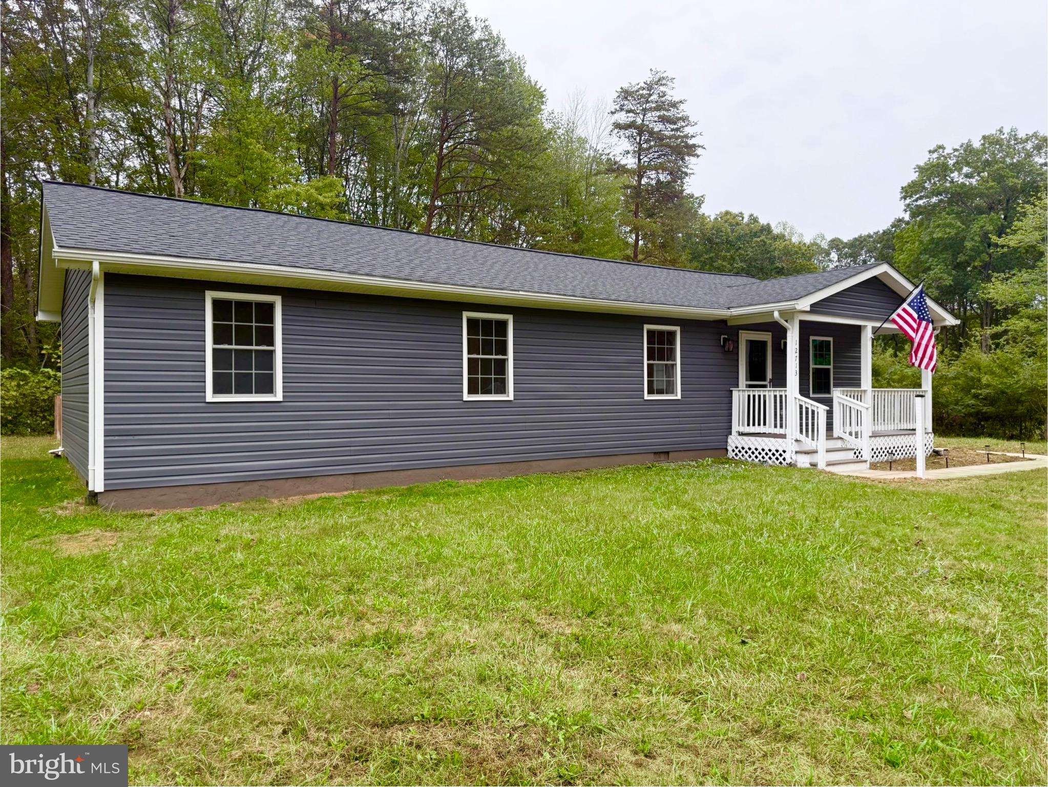 12713 Foxtrot Road Bealeton, VA 22712 - Photo 16 of 19 a front view of a house with garden