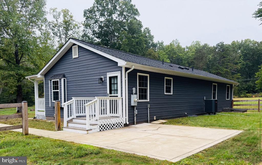 12713 Foxtrot Road Bealeton, VA 22712 - Photo 17 of 19 a front view of a house with a yard