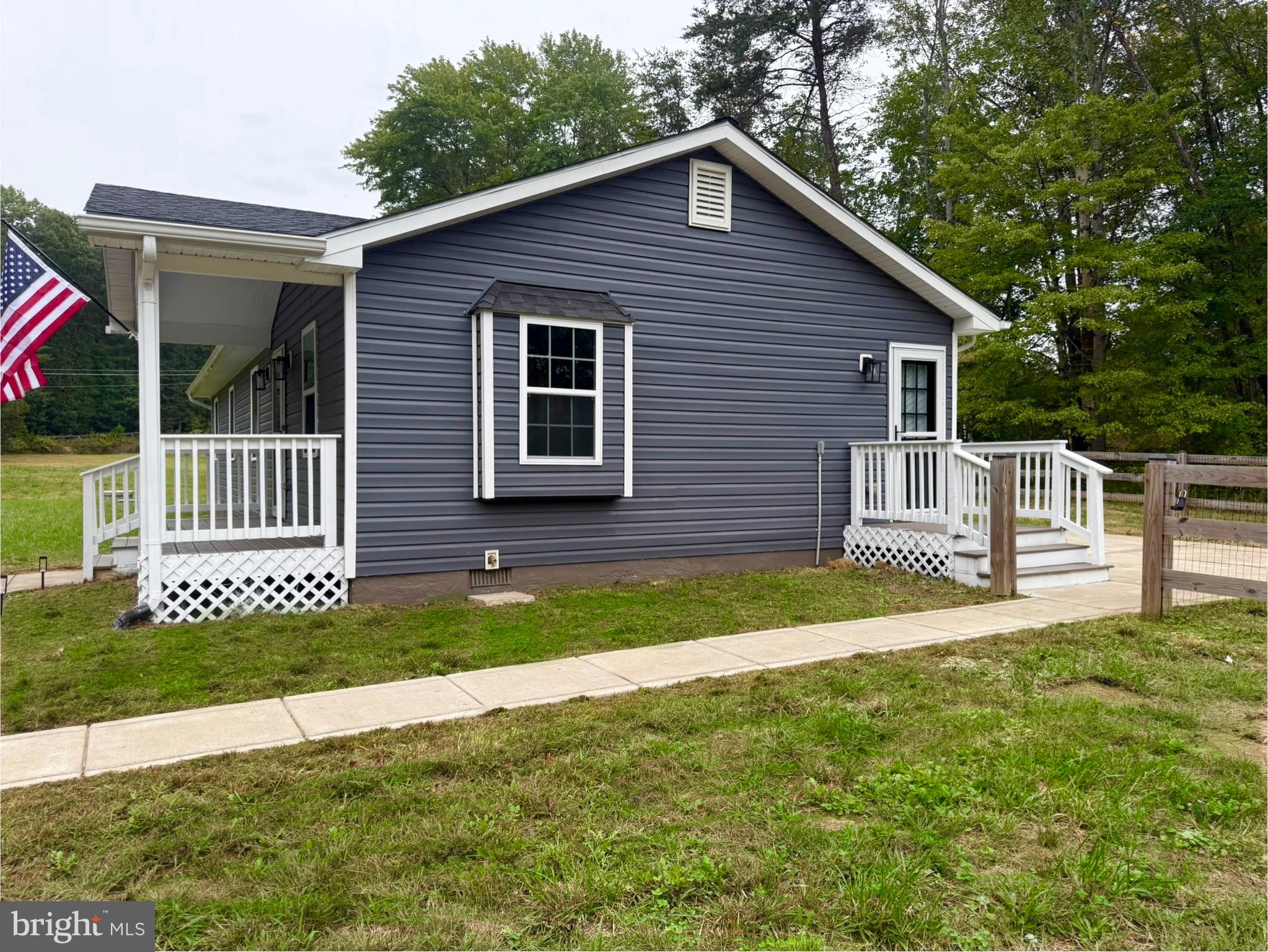 12713 Foxtrot Road Bealeton, VA 22712 - Photo 19 of 19 a front view of a house with a garden