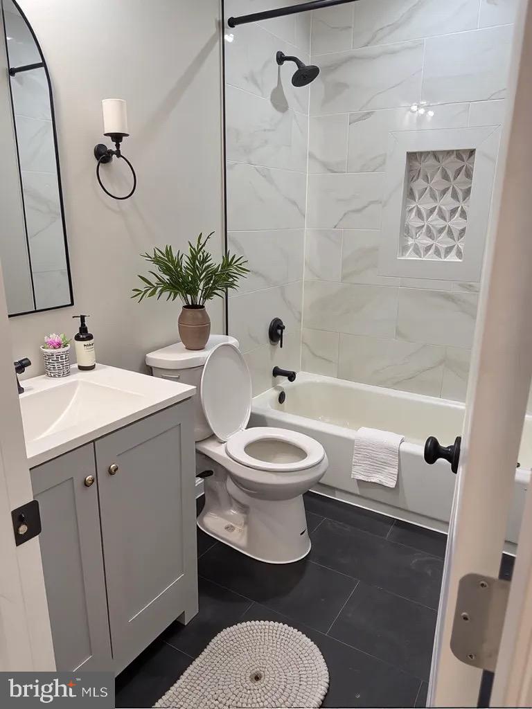 12713 Foxtrot Road Bealeton, VA 22712 - Photo 6 of 19 a bathroom with a sink a toilet a mirror and shower