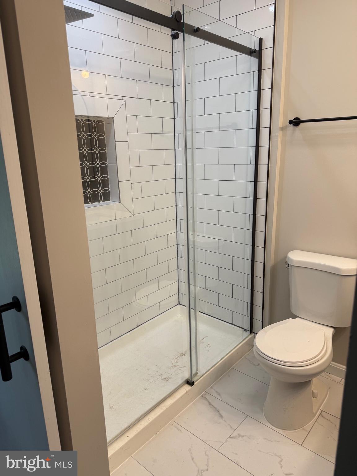 12713 Foxtrot Road Bealeton, VA 22712 - Photo 8 of 19 a bathroom with a toilet and a shower