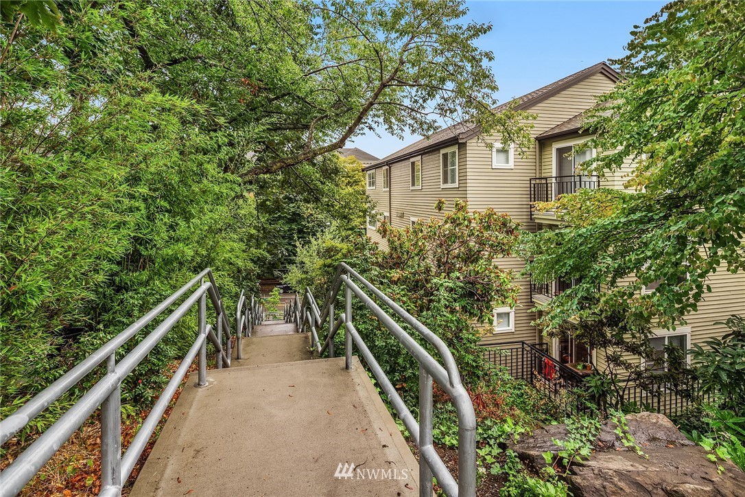 3901 Fremont Avenue North, Unit 206 Seattle, WA 98103 - Photo 14 of 15 a view of a house with a yard