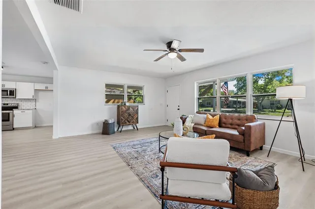a bathroom with a sink a vanity and a mirror