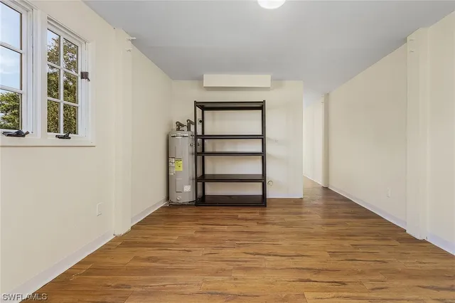 a view of a room with a wooden floor